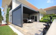 Notre zone d'activité pour ce service Pose de pergola bioclimatique avec toit à lames orientables et fermeture latérale pour un espace abrité et modulable